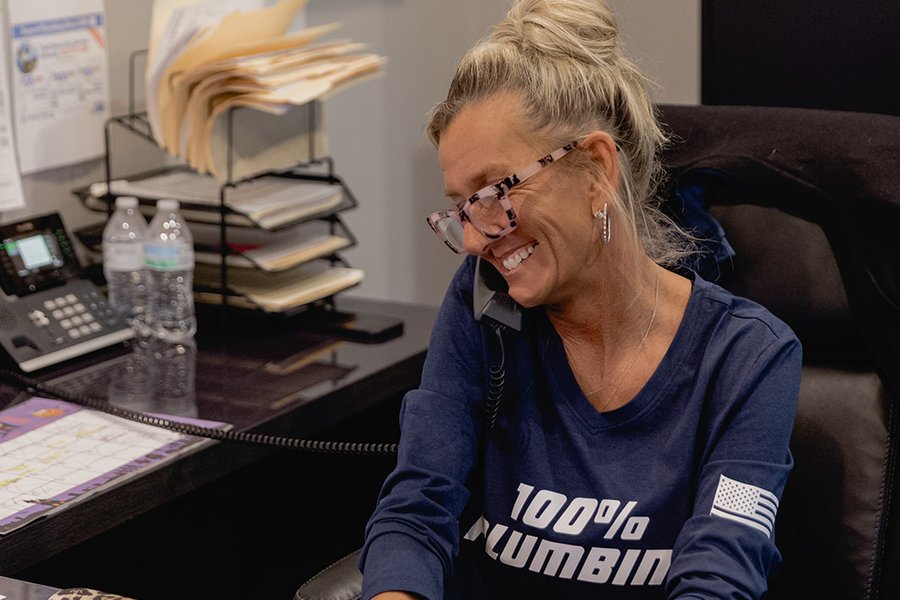 Kasi answering the phone live at 100% Plumbing