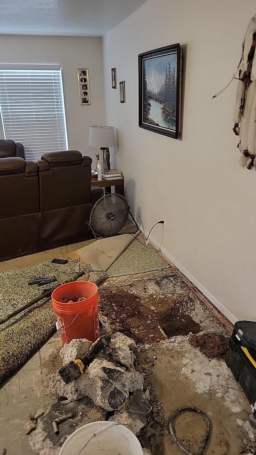 Slab leak repair in progress in Peoria AZ - exposed pipe under concrete slab